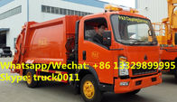 SINO TRUK HOWO 4*2 RHD 5CBM 4tons wastes collecting vehicles, refuse garbage trucks customized for Timor-Leste clients