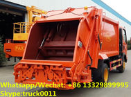 SINO TRUK HOWO 4*2 RHD 5CBM 4tons wastes collecting vehicles, refuse garbage trucks customized for Timor-Leste clients