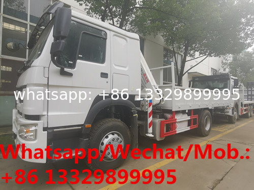 Customized SINO TRUK HOWO 5T knuckle crane boom mounted on cargo truck for overseas clients, cargo truck with crane