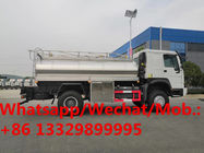 Customized SINO TRUK HOWO 266hp diesel 1,000L fresh milk tanker vehicle for sale, stainless steel liquid food beer truck