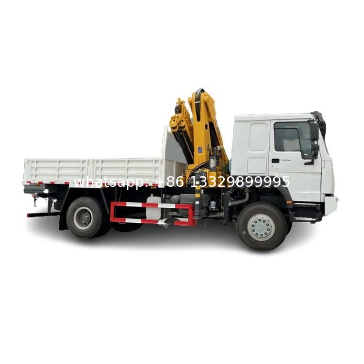 Customized SINO TRUK HOWO 5T knuckle crane boom mounted on cargo truck for overseas clients for sale